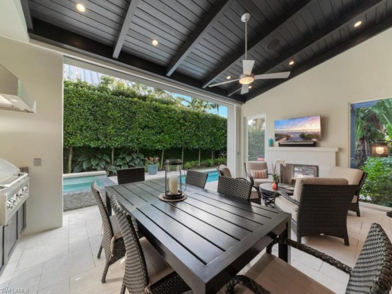 outdoor seating area with pool of Naples rental